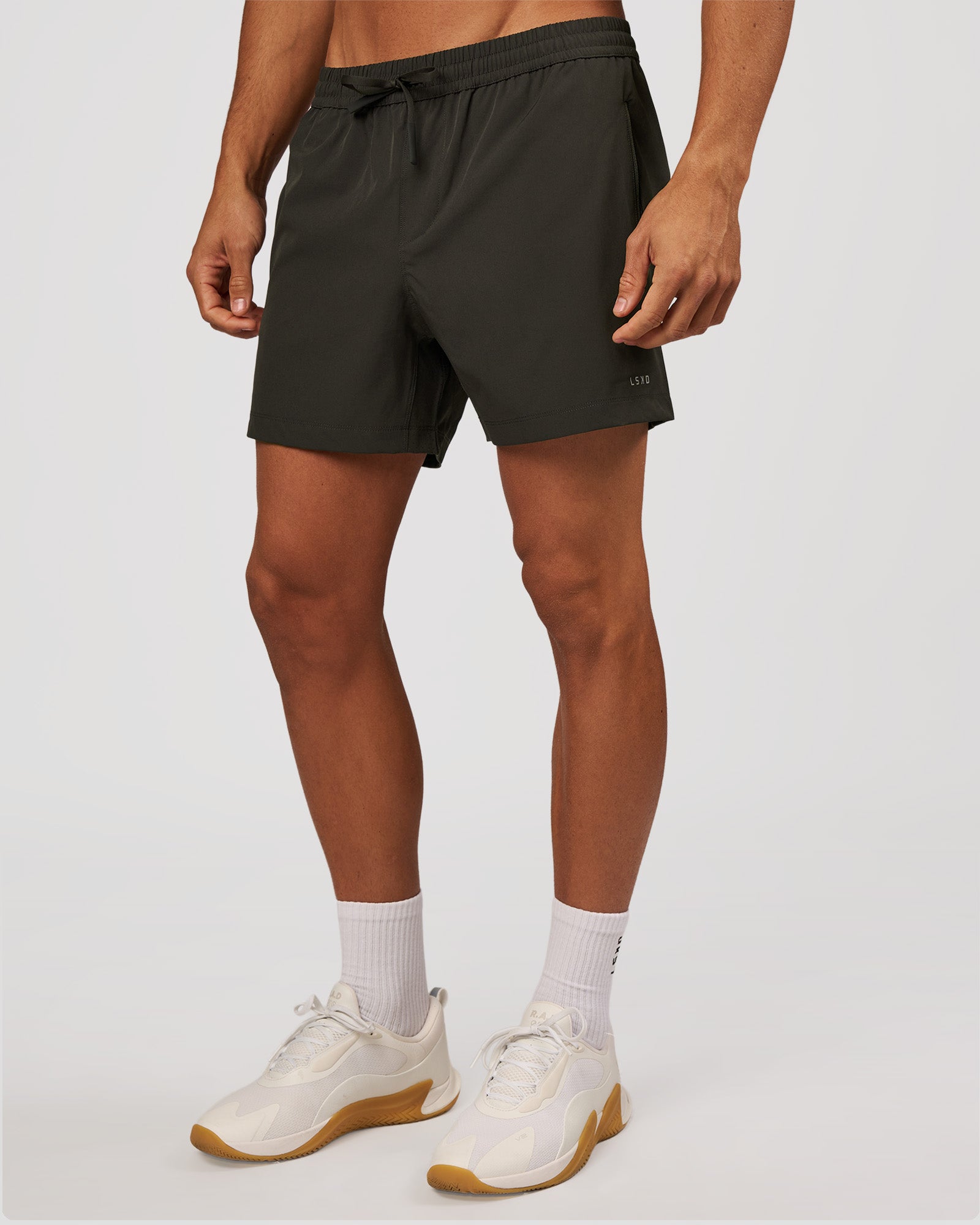 Man wearing Rep 5" Performance Short - Onyx | Model:Albert | Size:M