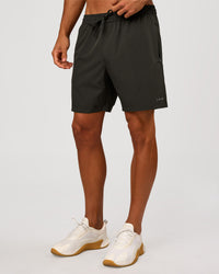 Man wearing Rep 7" Performance Short - Onyx | Model:Albert | Size:M | Thumbnail Index: 2