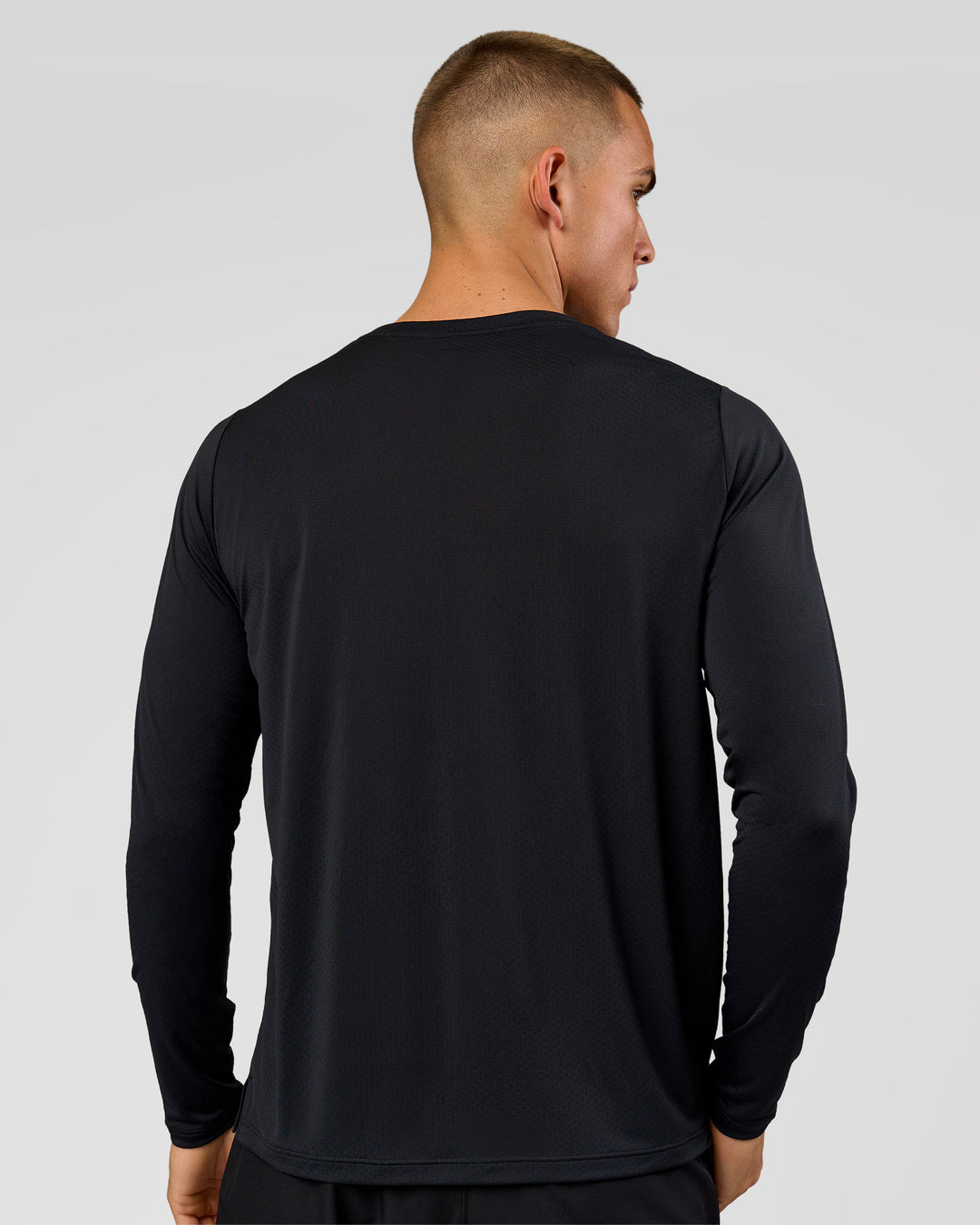 Man wearing Rep Training Long Sleeve  - Black | Model:Albert | Size:M