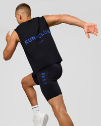 Man wearing Run Club FLXCotton Tank - Black-Electric Indigo | Model:Albert | Size:M