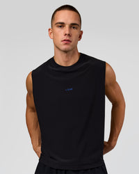 Man wearing Run Club Elevate Muscle Tank - Black-Electric Indigo | Model:Albert | Size:M