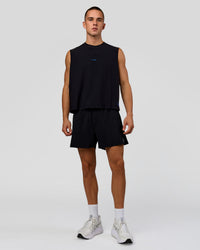 Man wearing Run Club Elevate Muscle Tank - Black-Electric Indigo | Model:Albert | Size:M