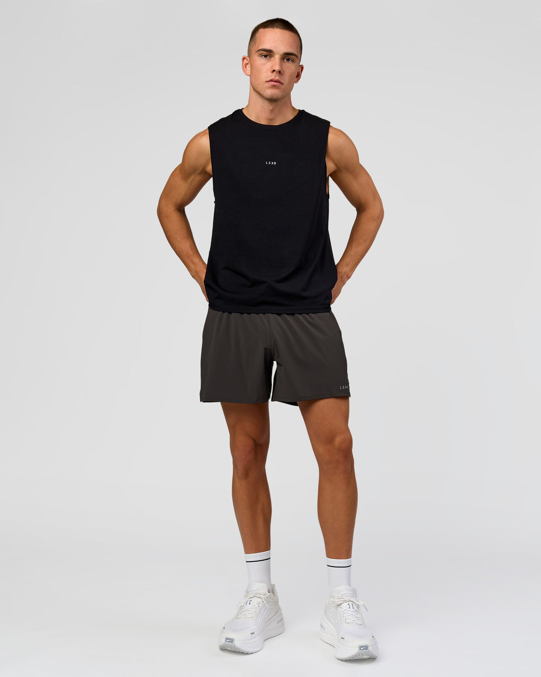 Man wearing Run Club FLXCotton Tank - Black-White | Model:Albert | Size:M