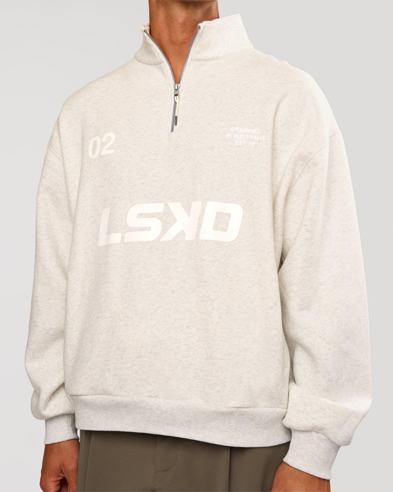 Man wearing Stadium Quarter Zip Sweater - Silver Marl | Model:Albert | Size:M