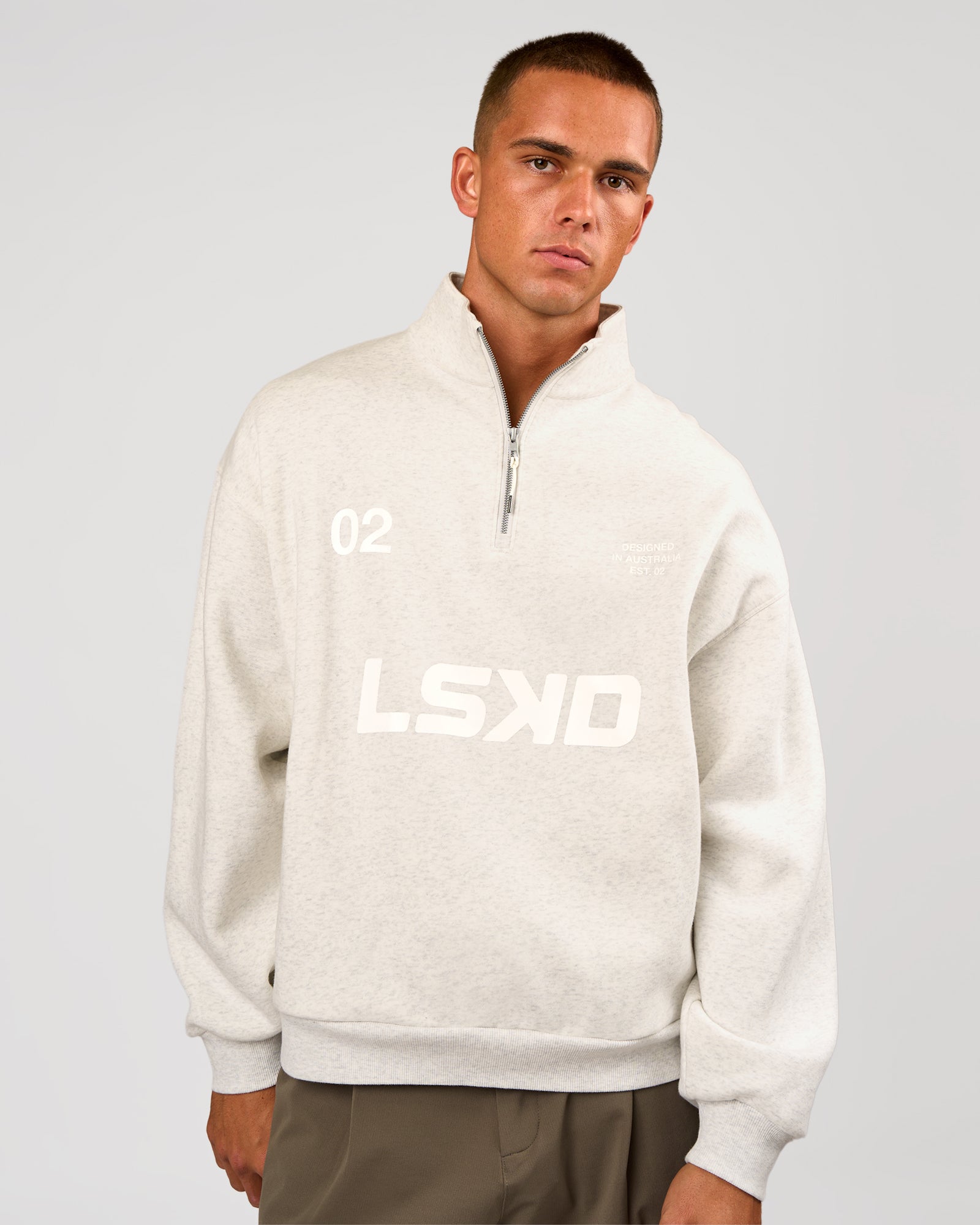 Man wearing Stadium Quarter Zip Sweater - Silver Marl | Model:Albert | Size:M