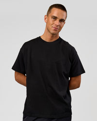 Man wearing Tonal Legacy Heavyweight Oversized Tee - Black-Black | Model:Albert | Size:M | Thumbnail Index: 7
