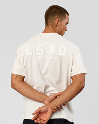 Man wearing Tonal Legacy Heavyweight Oversized Tee - Off White-Off White | Model:Albert | Size:M | Thumbnail Index: 1