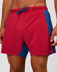 Man wearing UltraAir 5" Lined Performance Short - Scarlet-Electric Indigo | Model: Albert | Size: M | Thumbnail Index: 0