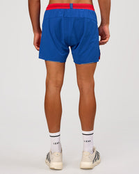 Man wearing UltraAir 5" Lined Performance Short - Scarlet-Electric Indigo | Model: Albert | Size: M | Thumbnail Index: 3