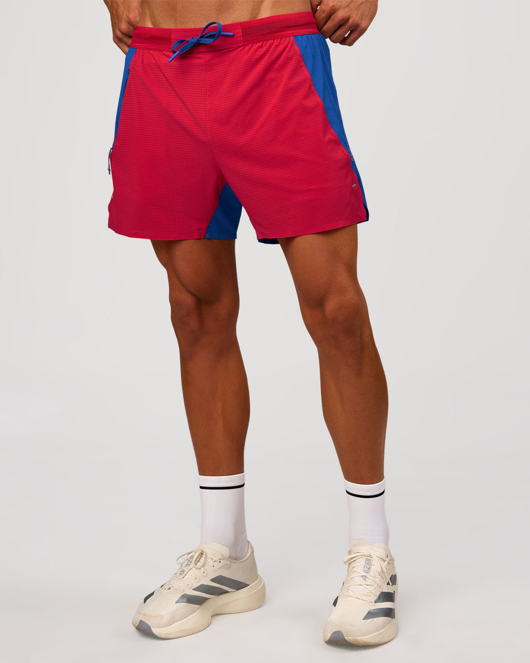 Man wearing UltraAir 5" Lined Performance Short - Scarlet-Electric Indigo | Model: Albert | Size: M - view 11