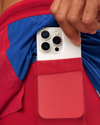 Man wearing UltraAir 5" Lined Performance Short - Scarlet-Electric Indigo | Model: Albert | Size: M | Thumbnail Index: 2