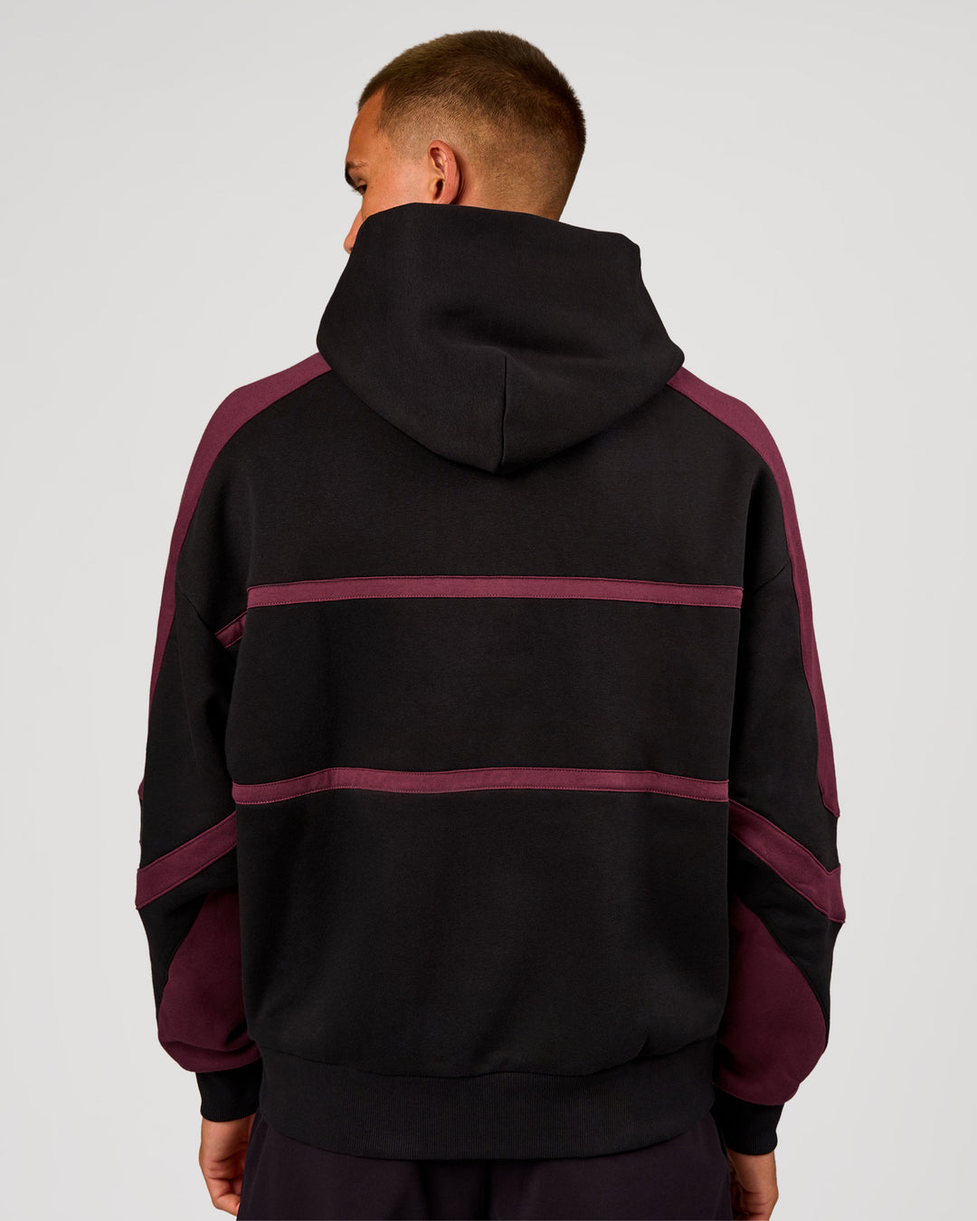 Man wearing Vibe Oversized Hoodie - Black-Cherry Lacquer | Model:Albert | Size:M - view 6