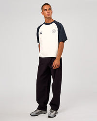 Man wearing Victory Heavyweight Boxed Raglan Tee - Silver Marl-Midnight Navy | Model:Albert | Size:M | Thumbnail Index: 9