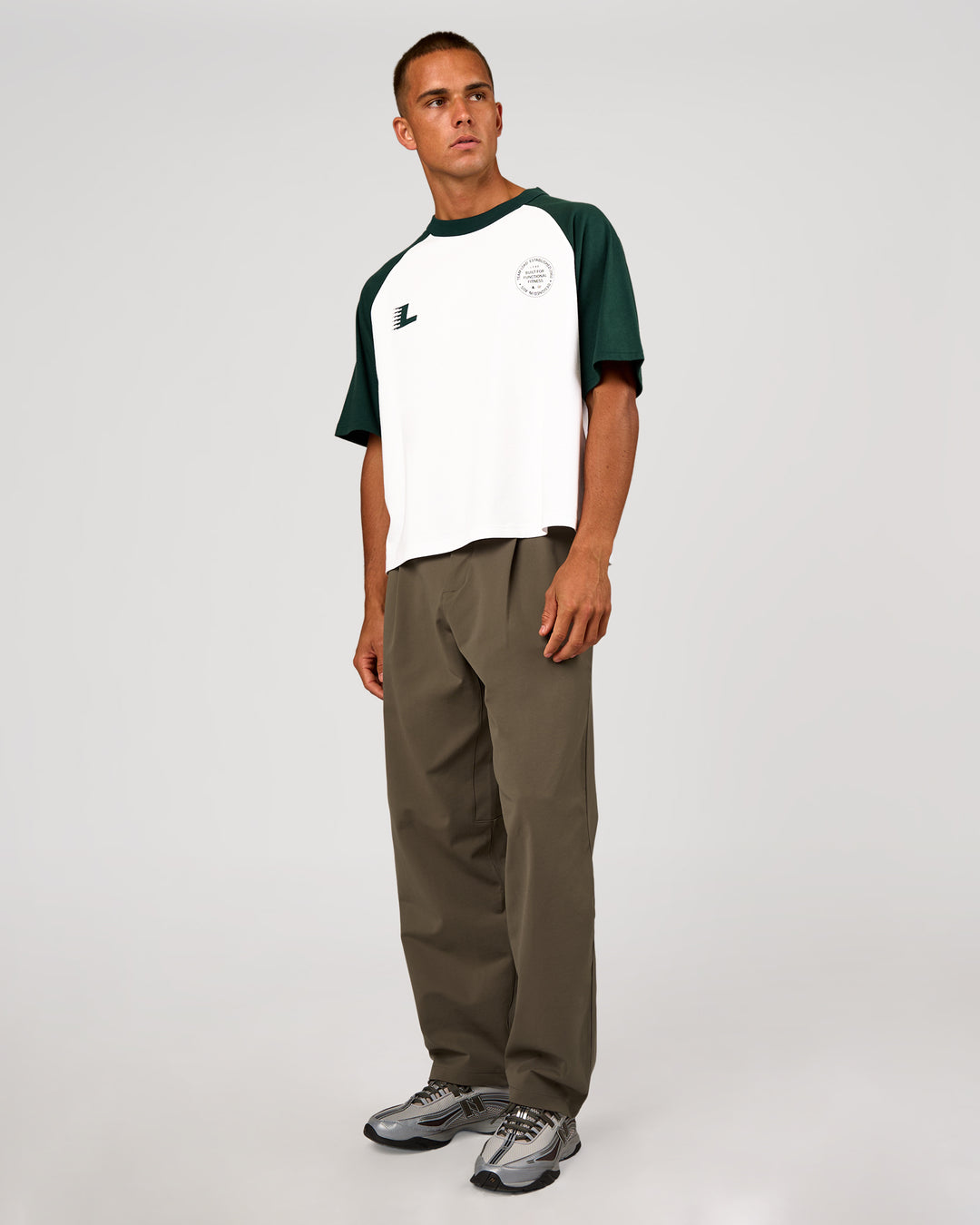 Man wearing Victory Heavyweight Boxed Raglan Tee - White-Midnight Green | Model:Albert | Size:M - view 12