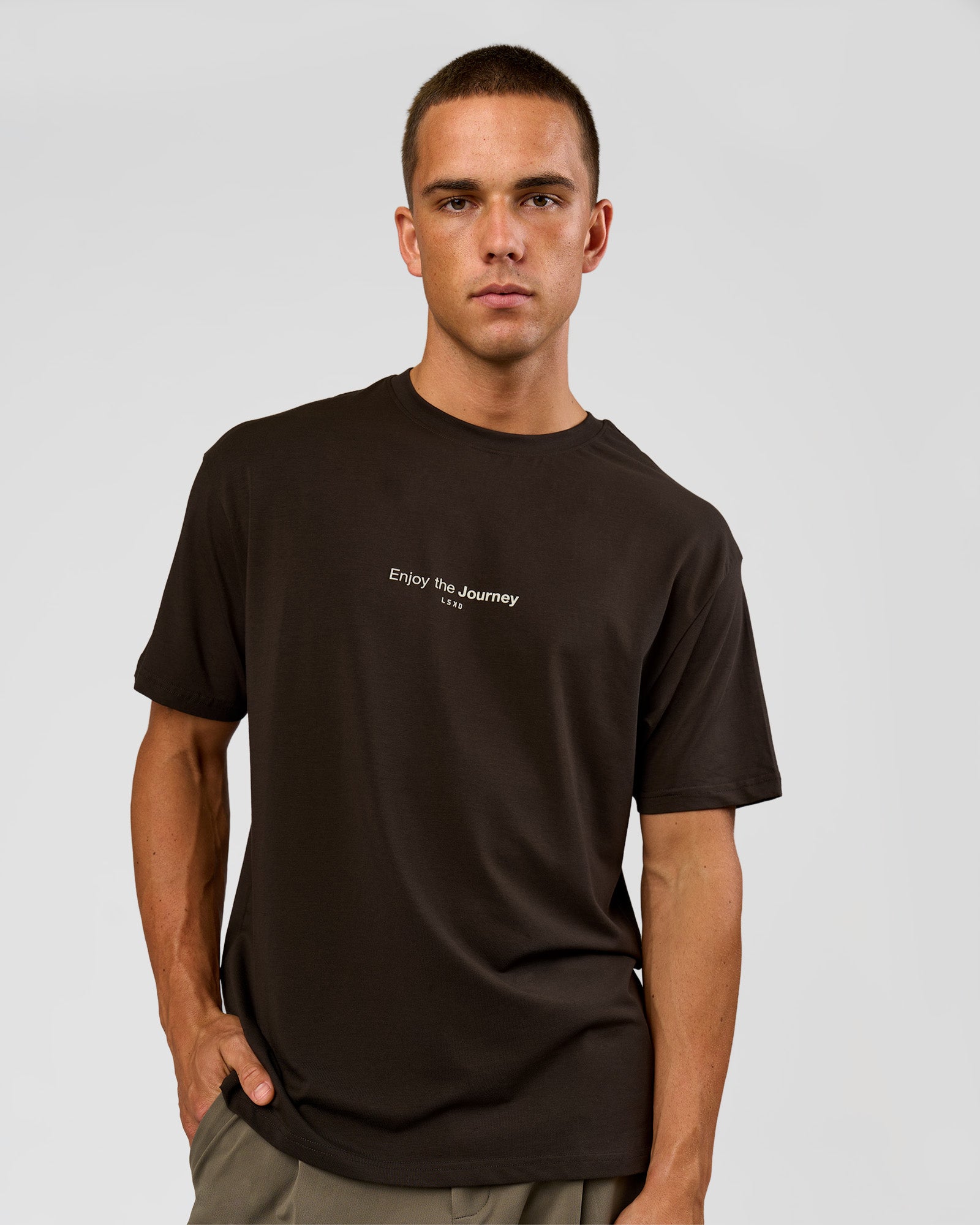Man wearing VS1 Enjoy The Journey FLXCotton Oversize Tee - Ground Coffee | Model:Albert | Size:M