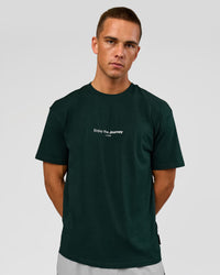 Man wearing VS1 Enjoy The Journey FLXCotton Oversize Tee - Midnight Green | Model:Albert | Size:M | Thumbnail Index: 1