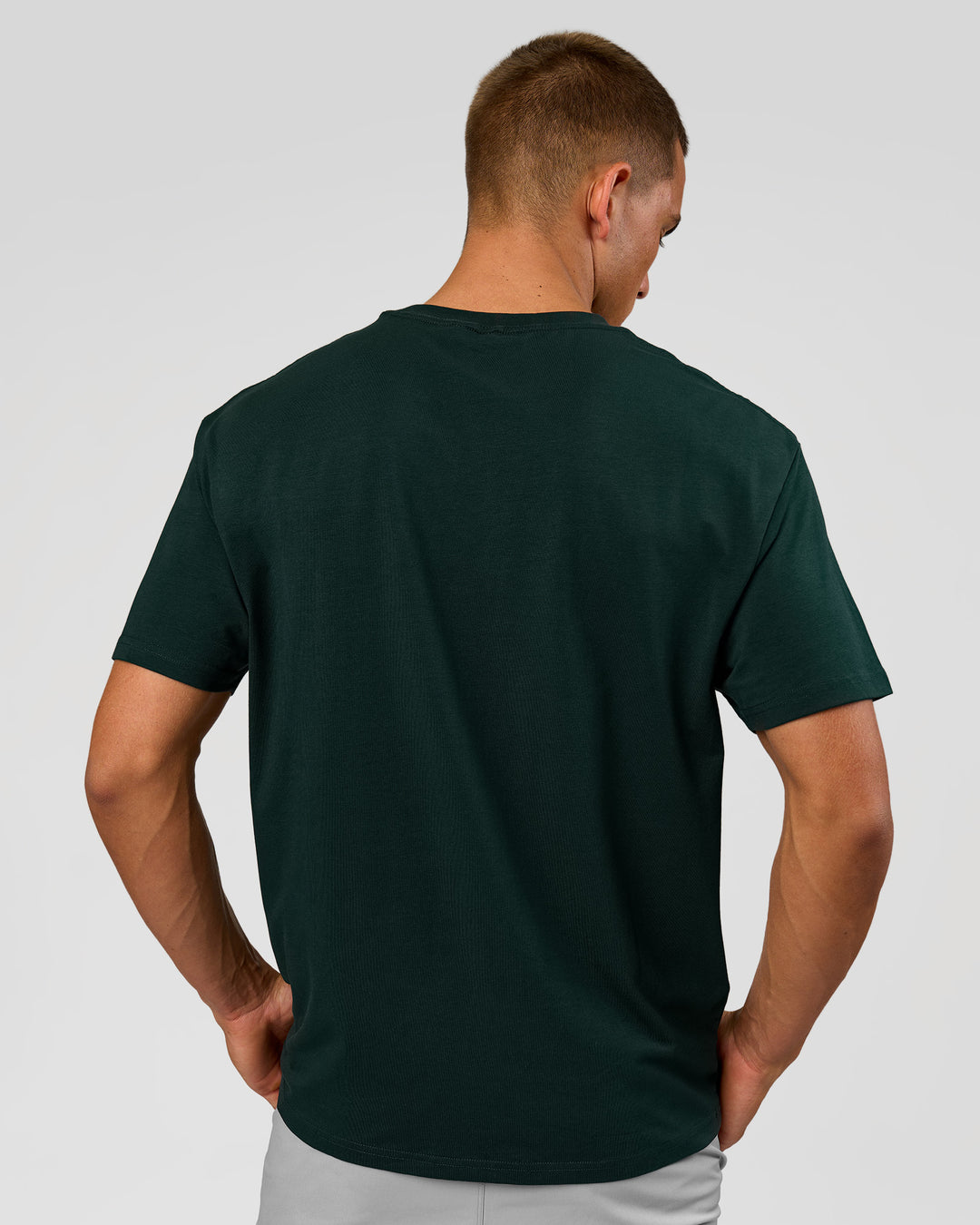 Man wearing VS1 Enjoy The Journey FLXCotton Oversize Tee - Midnight Green | Model:Albert | Size:M - view 5