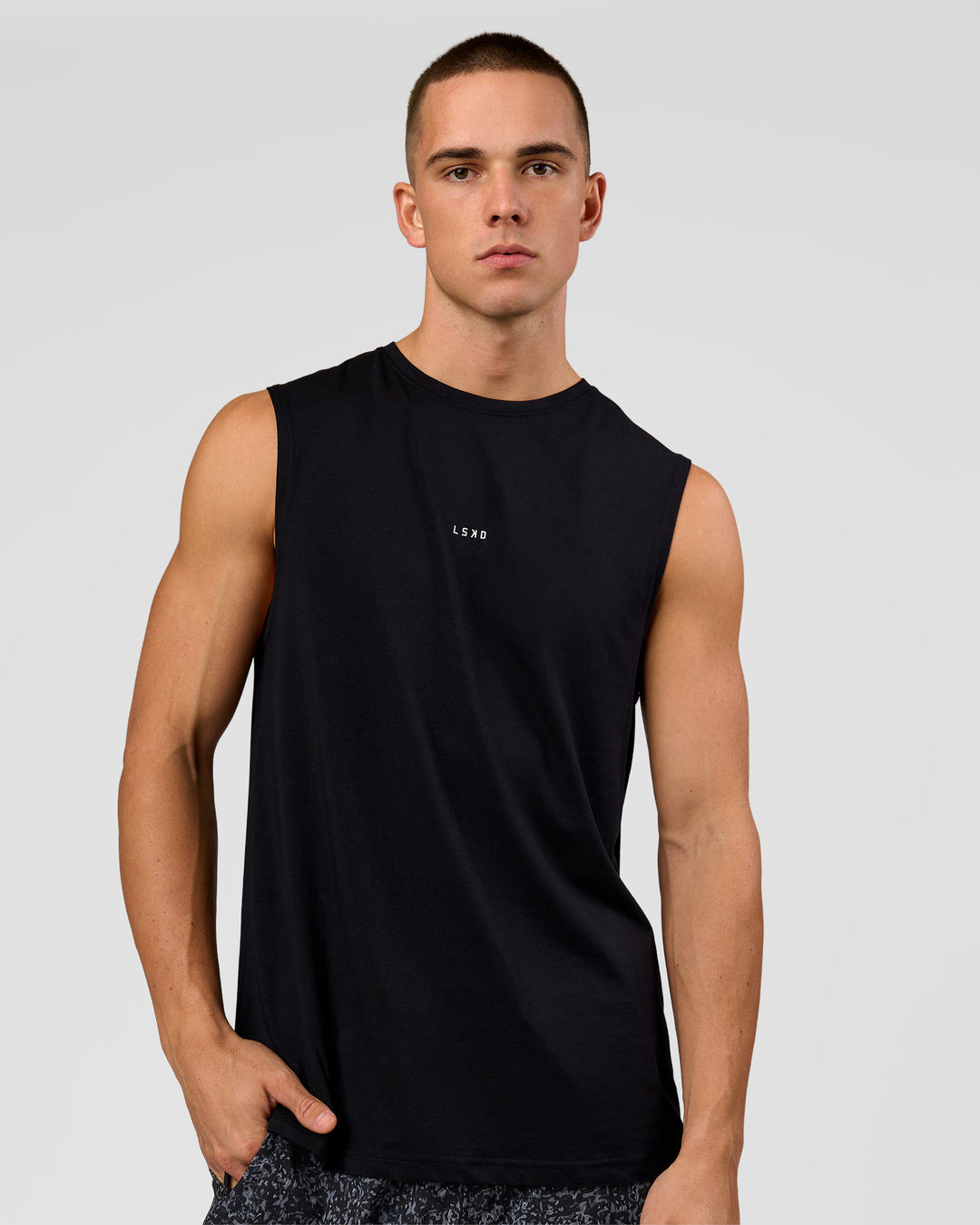 Man wearing Base FLXCotton Tank - Black | Model:Base | Size:M - view 3