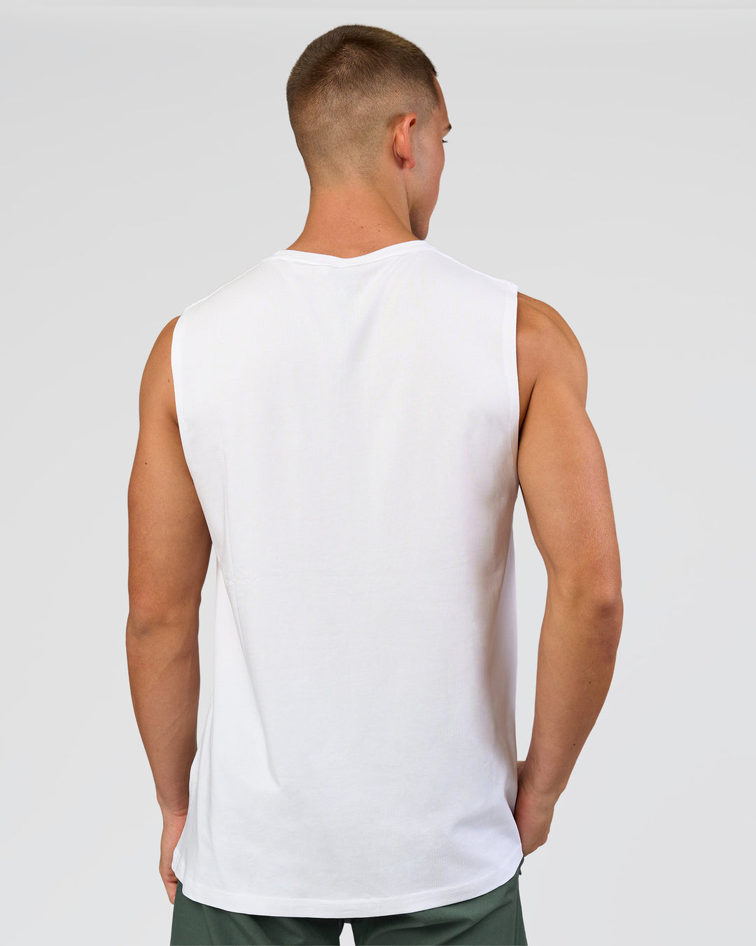 Man wearing Base FLXCotton Tank - White | Model:Base | Size:M