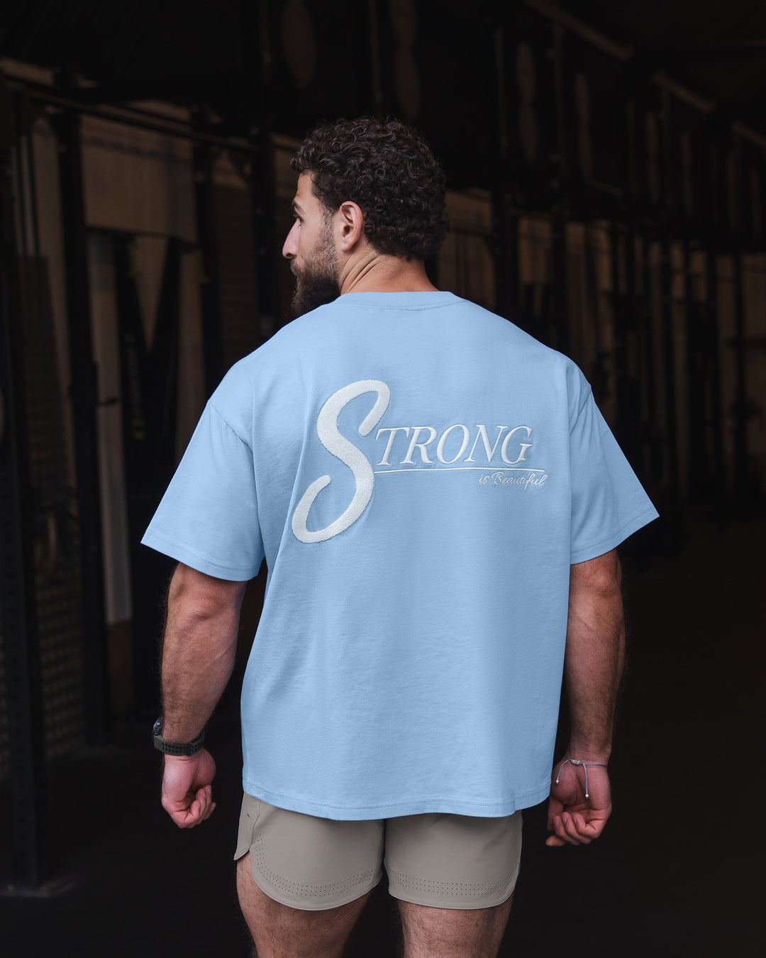 Man wearing Strong is Beautiful Heavyweight Oversized Tee - Open Air | Model:Fod | Size:M - view 2