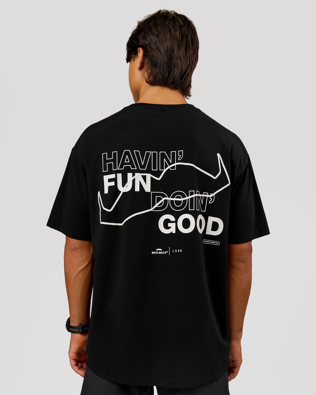 Man wearing Movember x LSKD FLXCotton Oversize Tee - Black-White | Model:George | Size:M - view 1