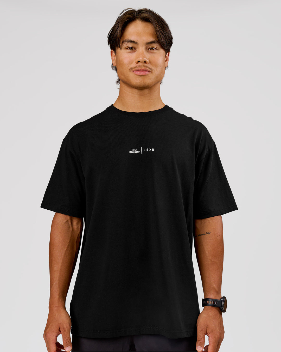 Man wearing Movember x LSKD FLXCotton Oversize Tee - Black-White | Model:George | Size:M - view 3