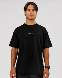 Man wearing Movember x LSKD FLXCotton Oversize Tee - Black-White | Model:George | Size:M | Thumbnail Index: 2