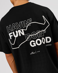 Man wearing Movember x LSKD FLXCotton Oversize Tee - Black-White | Model:George | Size:M | Thumbnail Index: 8