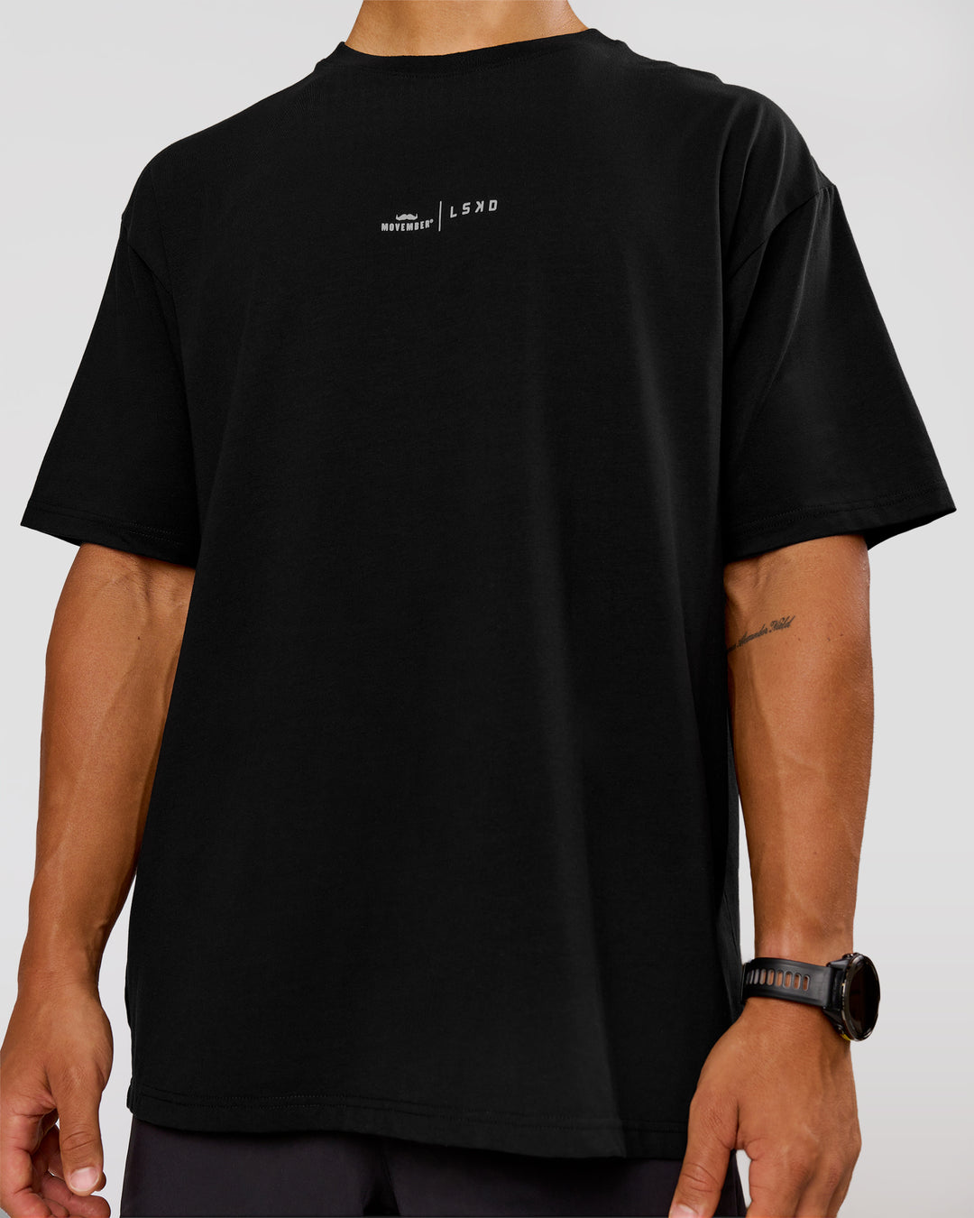Man wearing Movember x LSKD FLXCotton Oversize Tee - Black-White | Model:George | Size:M - view 12