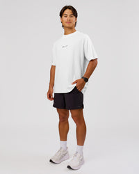 Man wearing Movember x LSKD FLXCotton Oversize Tee - White-Black | Model:George | Size:M | Thumbnail Index: 2