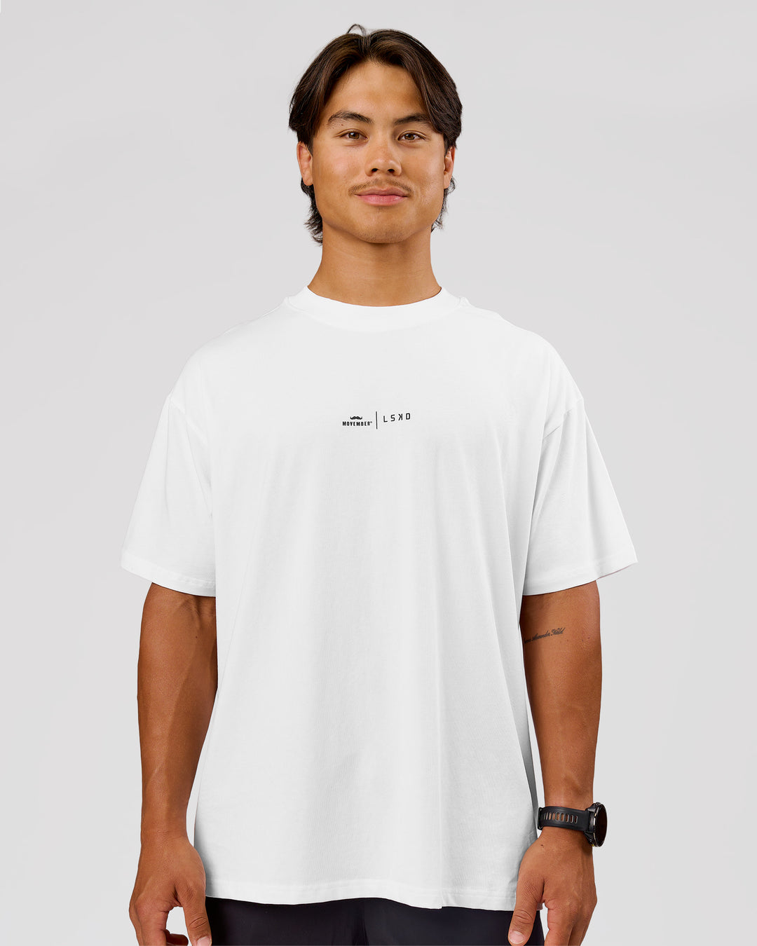 Man wearing Movember x LSKD FLXCotton Oversize Tee - White-Black | Model:George | Size:M - view 9