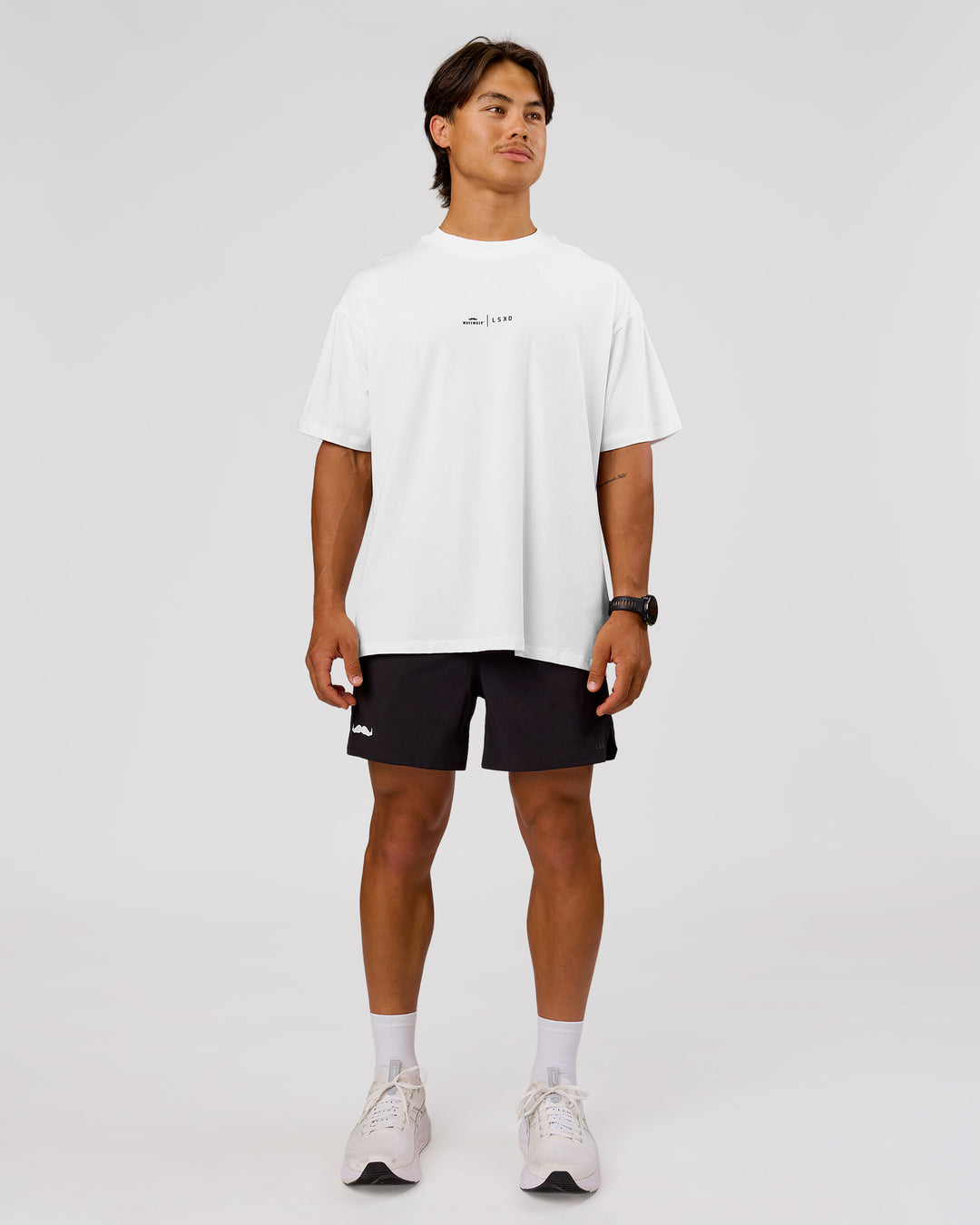 Man wearing Movember x LSKD FLXCotton Oversize Tee - White-Black | Model:George | Size:M - view 11