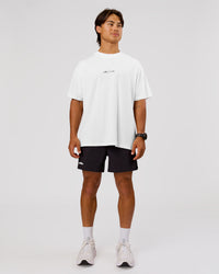 Man wearing Movember x LSKD FLXCotton Oversize Tee - White-Black | Model:George | Size:M | Thumbnail Index: 10