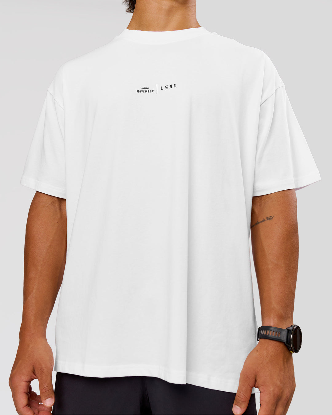 Man wearing Movember x LSKD FLXCotton Oversize Tee - White-Black | Model:George | Size:M - view 13