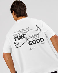 Man wearing Movember x LSKD FLXCotton Oversize Tee - White-Black | Model:George | Size:M | Thumbnail Index: 17