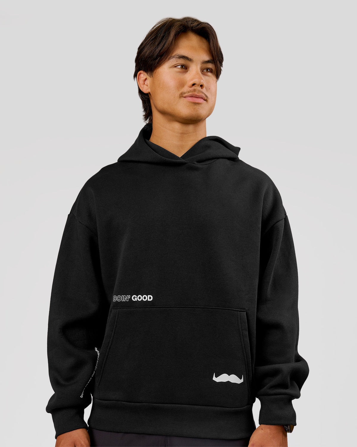 Man wearing Movember x LSKD Oversized Hoodie - Black | Model:George | Size:M - view 2