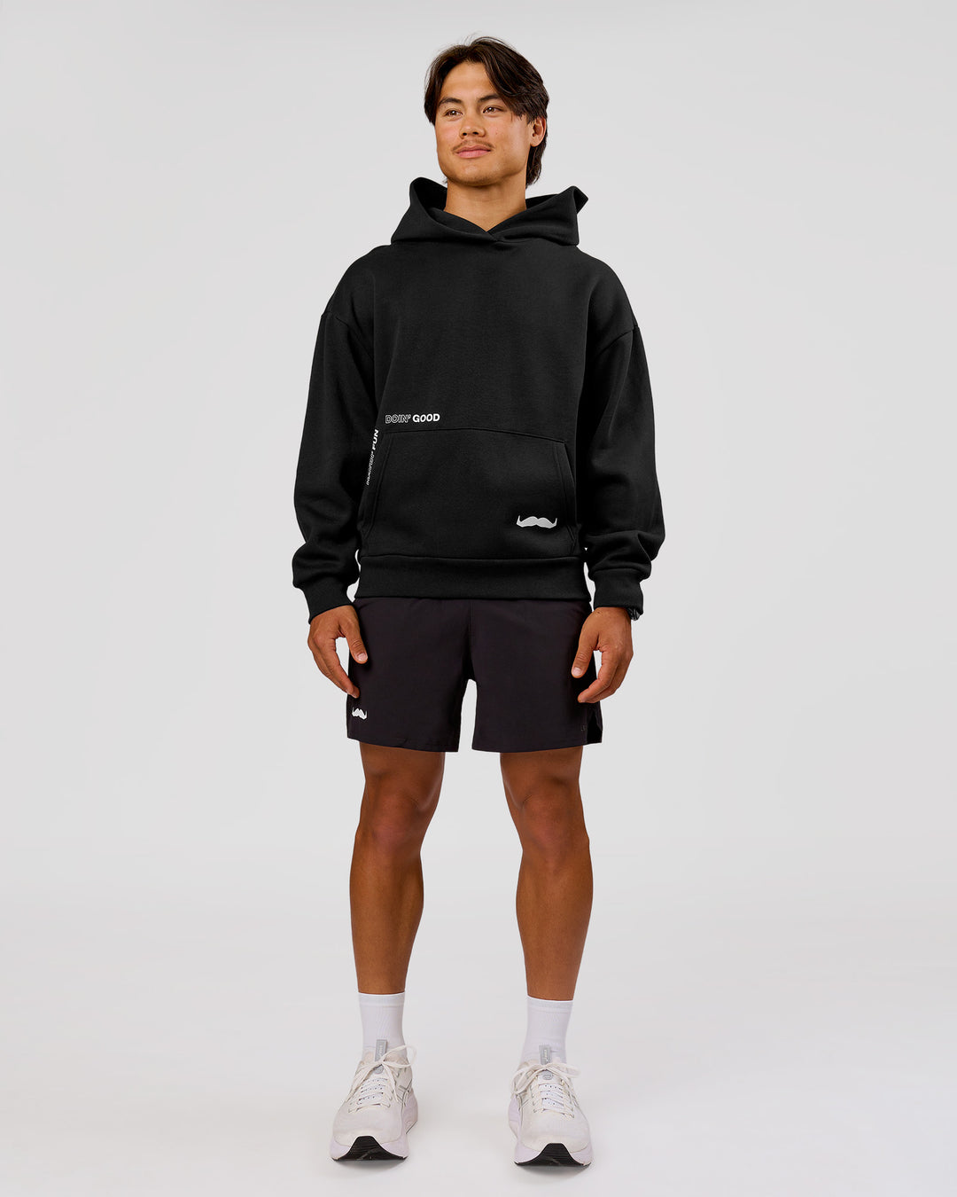 Man wearing Movember x LSKD Oversized Hoodie - Black | Model:George | Size:M - view 17