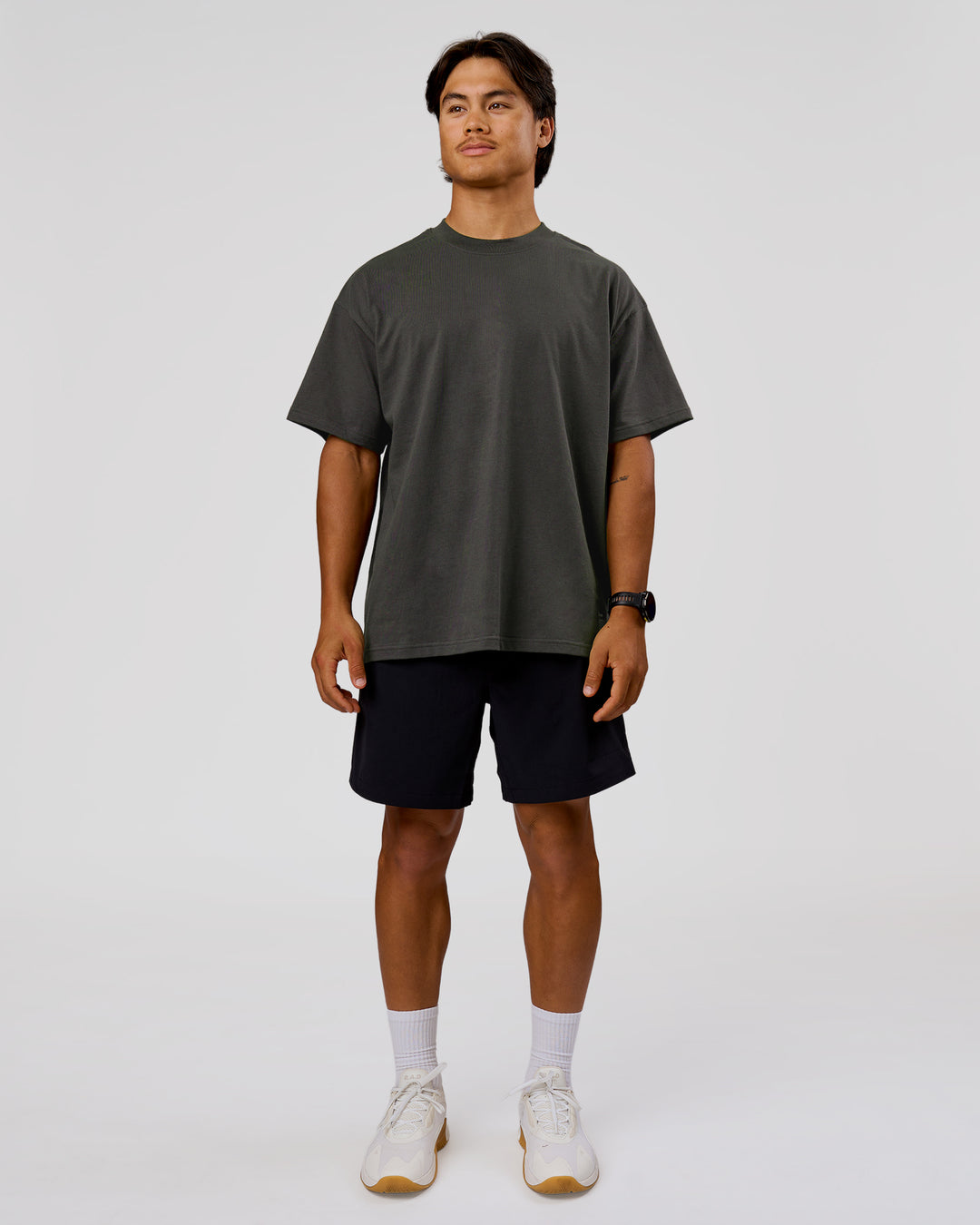 Man wearing Strata Heavyweight Oversized Tee - Onyx | Model:George | Size:M - view 4