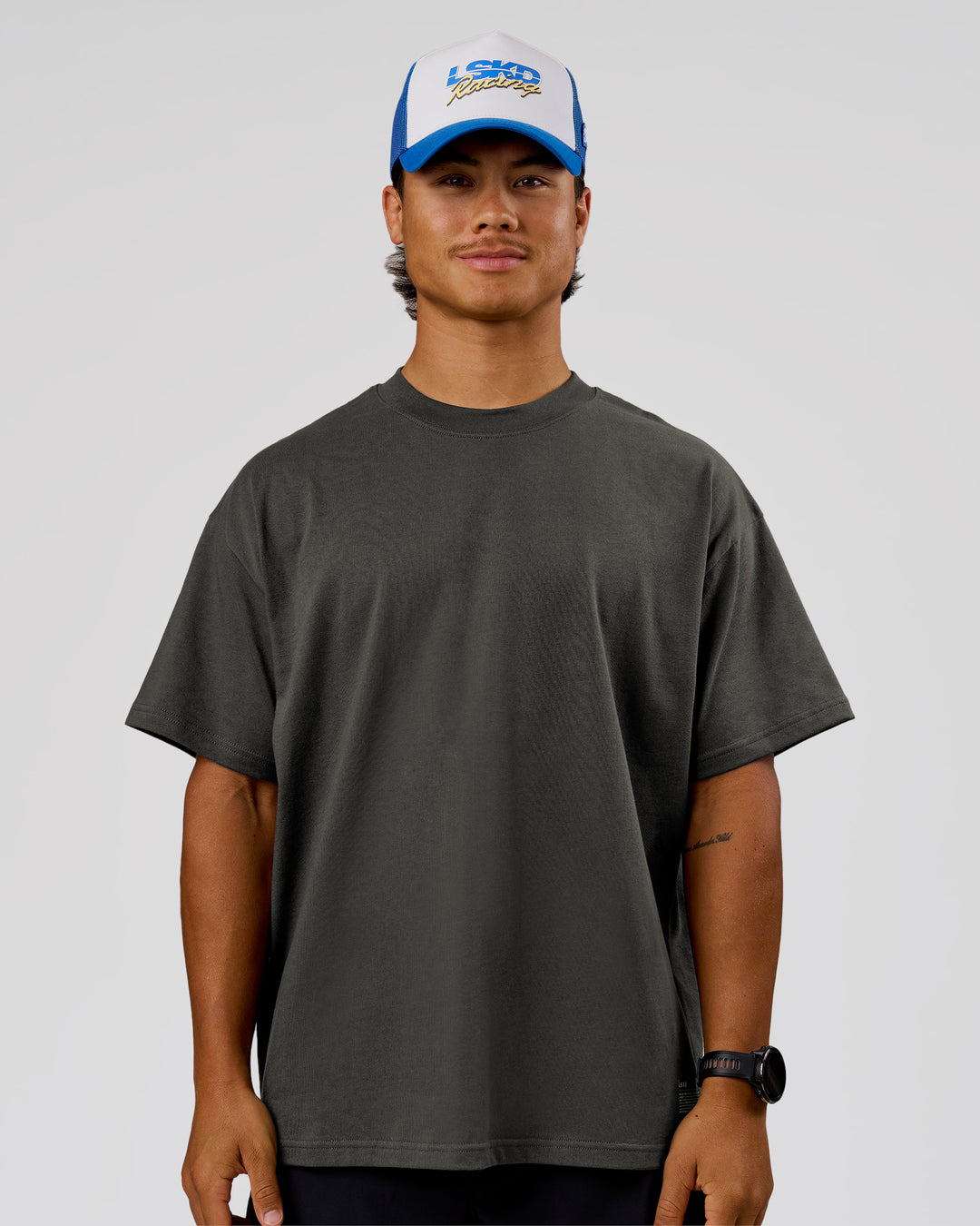 Man wearing Strata Heavyweight Oversized Tee - Onyx | Model:George | Size:M - view 1