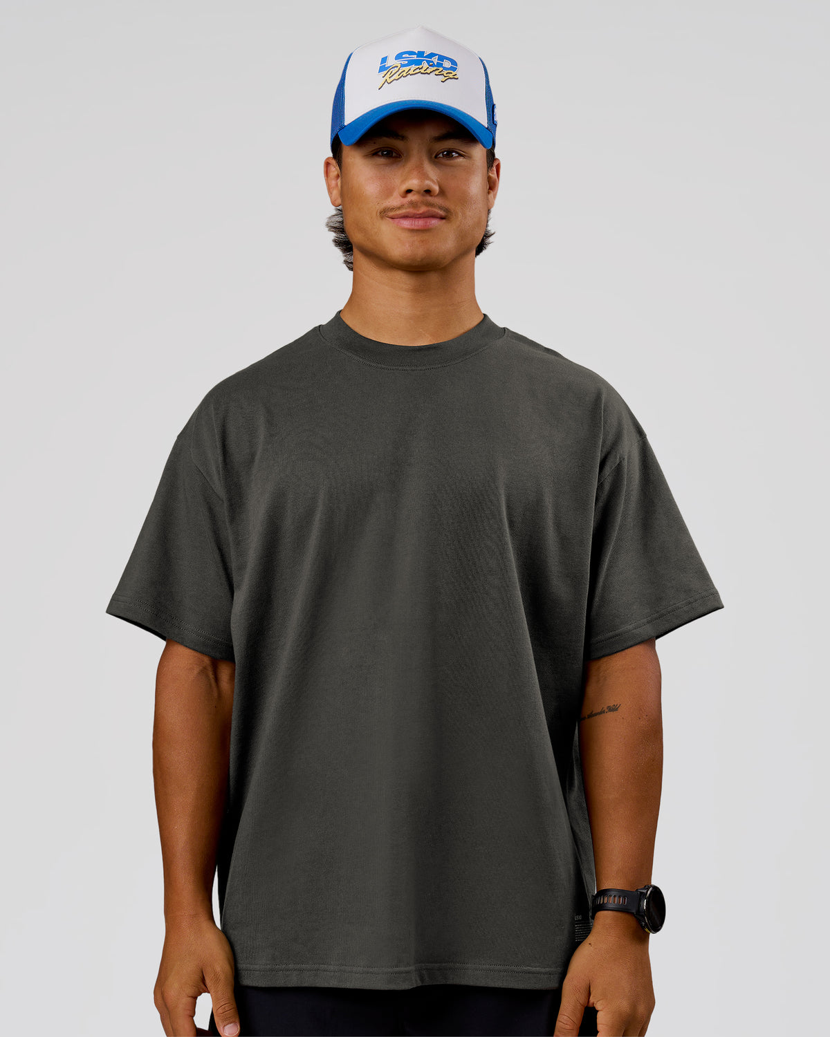 Man wearing Strata Heavyweight Oversized Tee - Onyx | Model:George | Size:M
