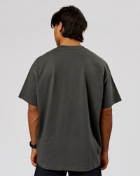 Man wearing Strata Heavyweight Oversized Tee - Onyx | Model:George | Size:M | Thumbnail Index: 2