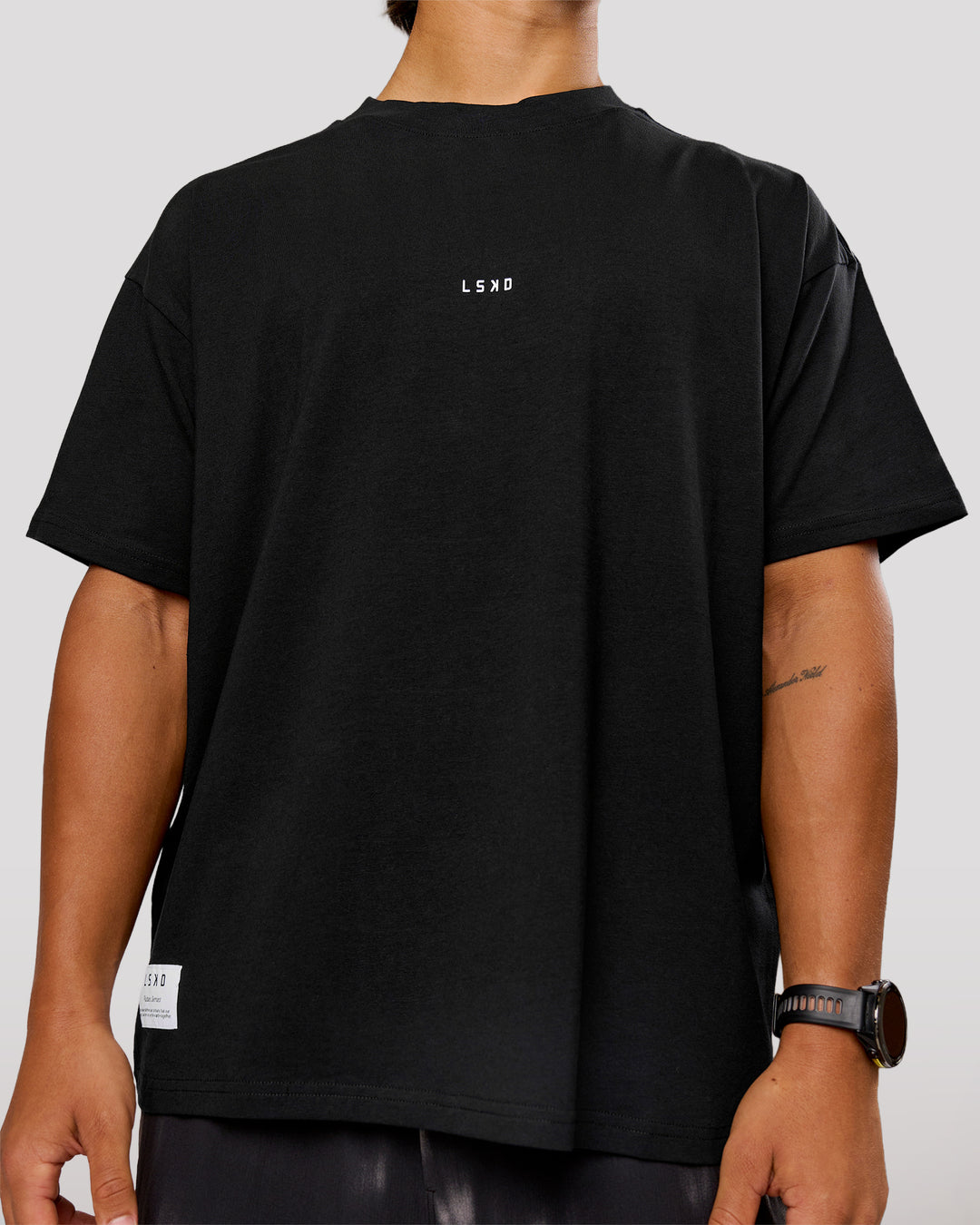 Man wearing VS26 Journey FLXCotton Oversize Tee - Black-White | Model:George | Size:M - view 5