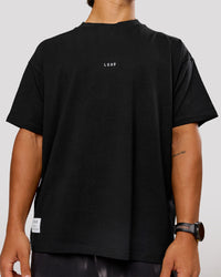 Man wearing VS26 Journey FLXCotton Oversize Tee - Black-White | Model:George | Size:M | Thumbnail Index: 4