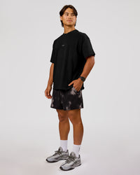 Man wearing VS26 Journey FLXCotton Oversize Tee - Black-White | Model:George | Size:M | Thumbnail Index: 12