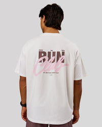 Man wearing Run Club Unisex Oversized Heavyweight FLXCotton Tee - Off White | Model:George | Size:M | Thumbnail Index: 1