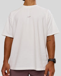 Man wearing Run Club Unisex Oversized Heavyweight FLXCotton Tee - Off White | Model:George | Size:M | Thumbnail Index: 2