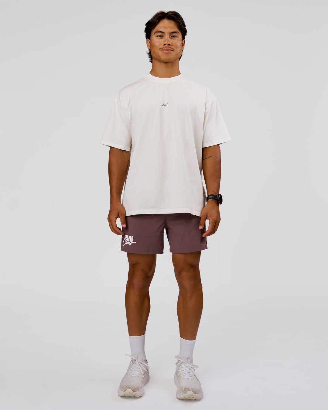 Man wearing Run Club Unisex Oversized Heavyweight FLXCotton Tee - Off White | Model:George | Size:M - view 5