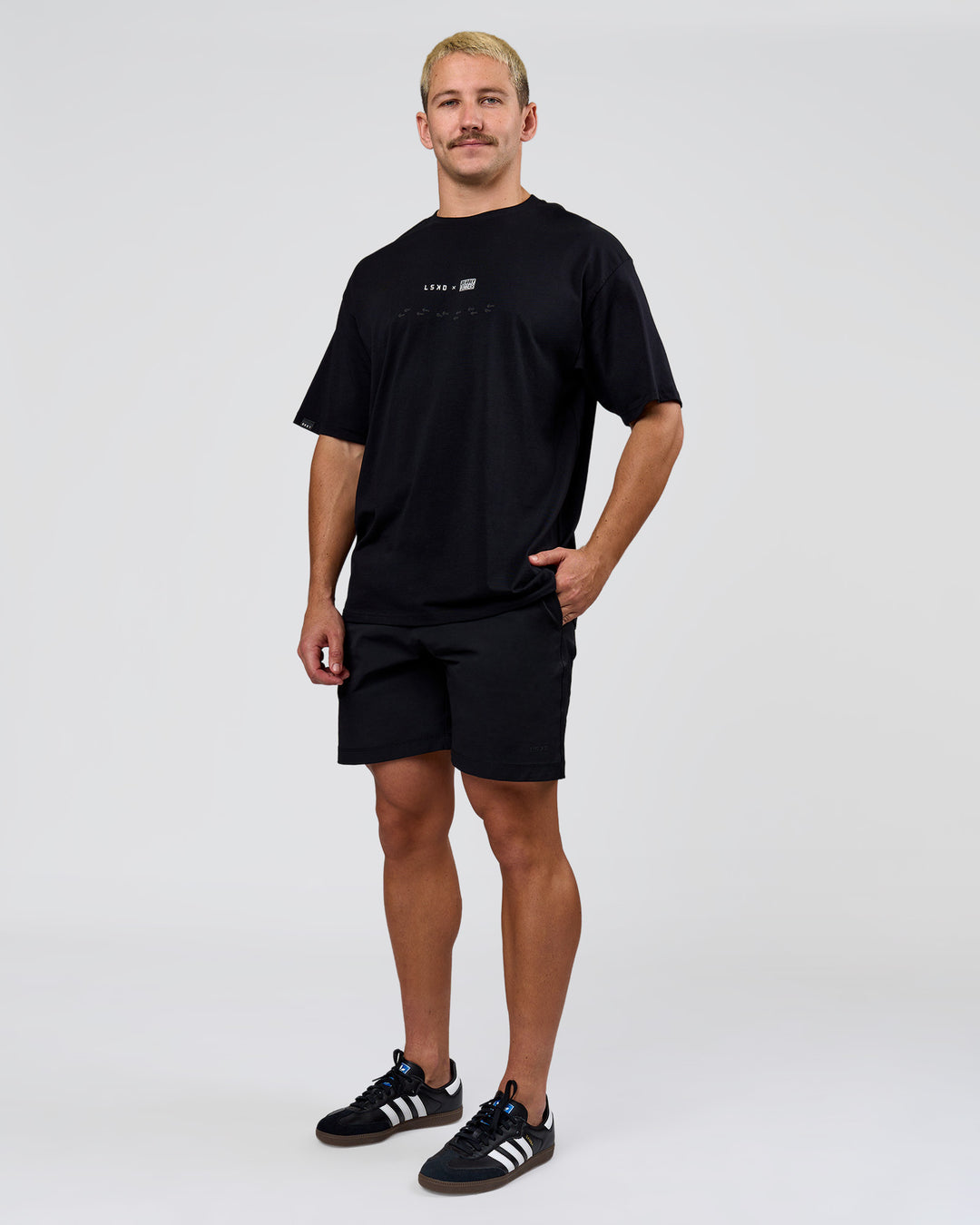 Man wearing Deadly Runners Run Club FLXCotton Oversize Tee - Black | Model:Jaiden | Size:M - view 9