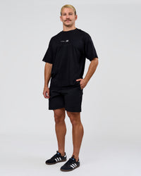 Man wearing Deadly Runners Run Club FLXCotton Oversize Tee - Black | Model:Jaiden | Size:M | Thumbnail Index: 8