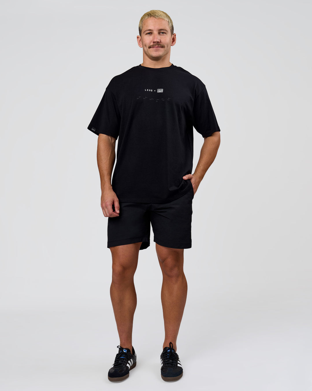 Man wearing Deadly Runners Run Club FLXCotton Oversize Tee - Black | Model:Jaiden | Size:M - view 12